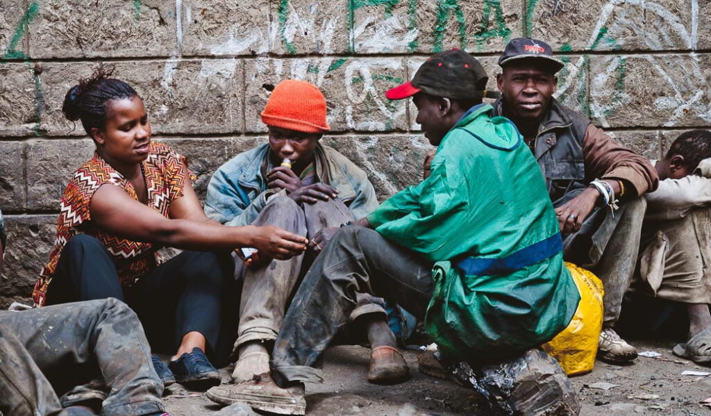 Mary from TKW talking to the homeless children on the street